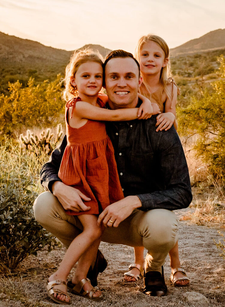 Dad with his two daughters after enjoying one of the spas in Peoria. Photographed by Amber, Cactus & Pine Photography