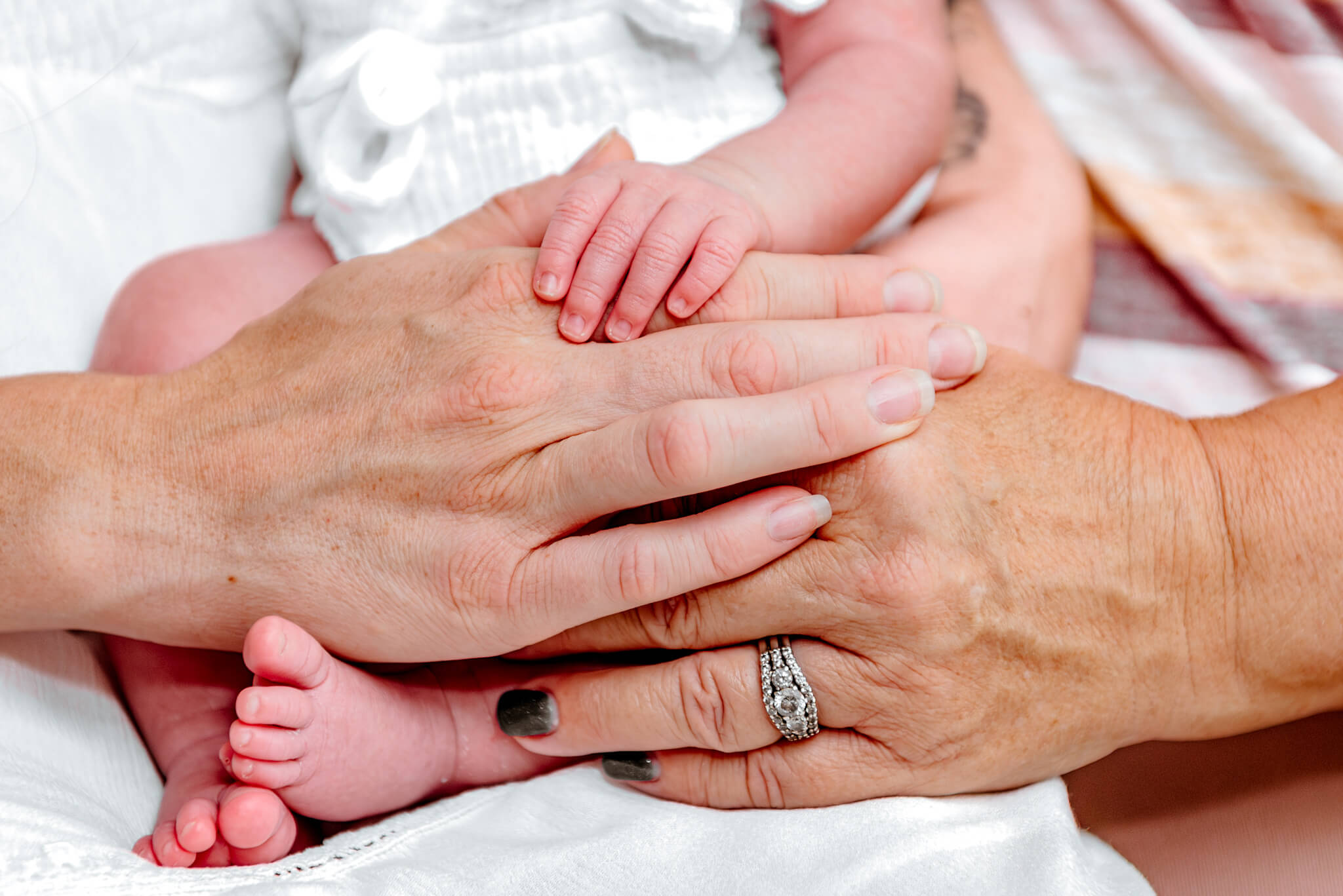 portrait of 3 generations of hands for hand casting phoenix