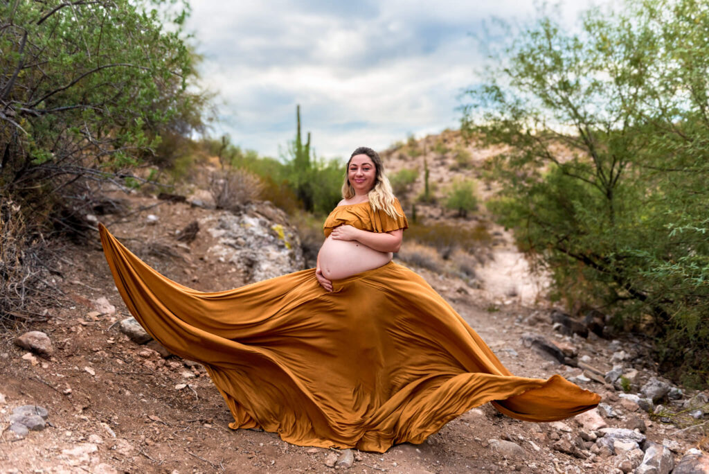 portrait of mom with tossed dress, maternity belly casting from maternity keepsake phoenix az