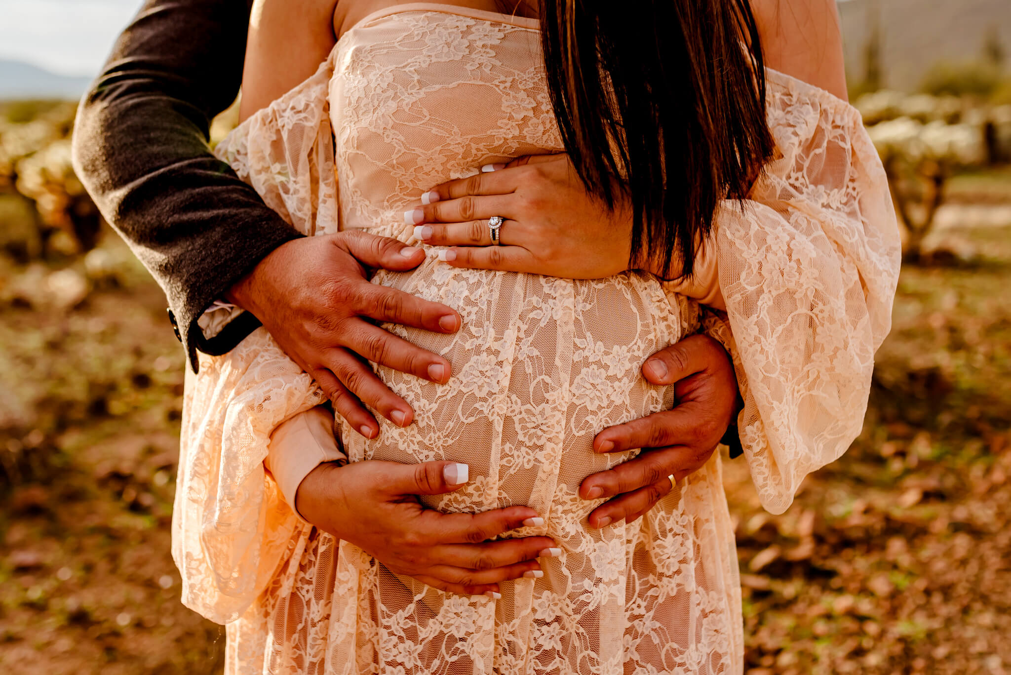 Arizona couple holding the baby bump for Maternity Keepsake in Phoenix