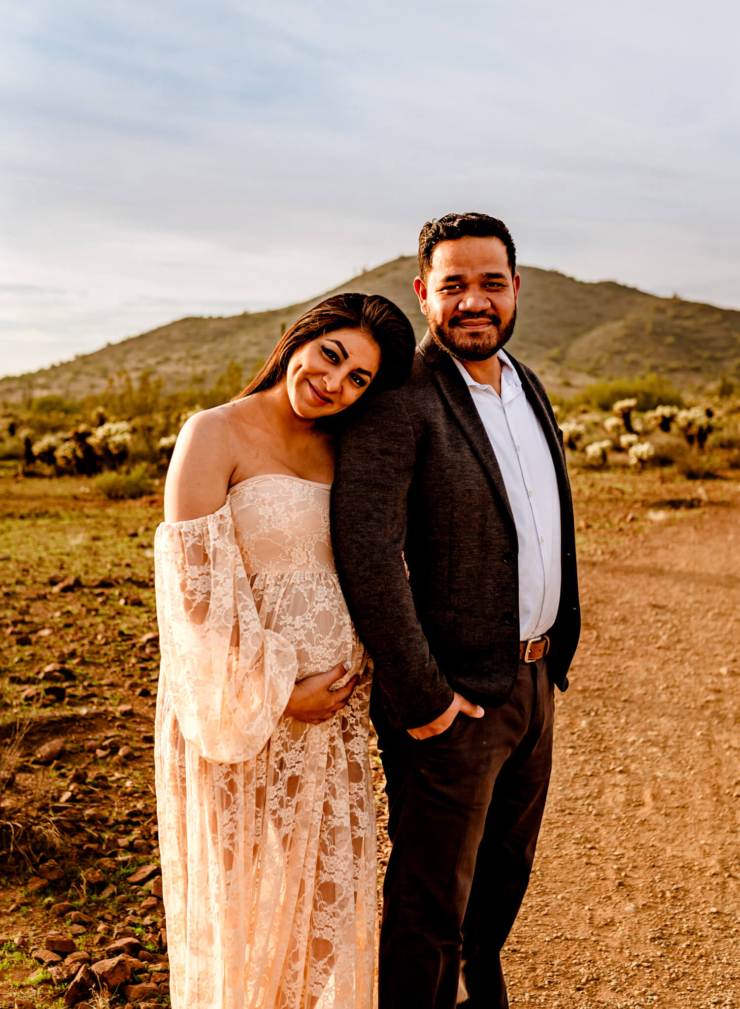 Phoenix AZ mom-to-be holding the baby bump used at Maternity Keepsake