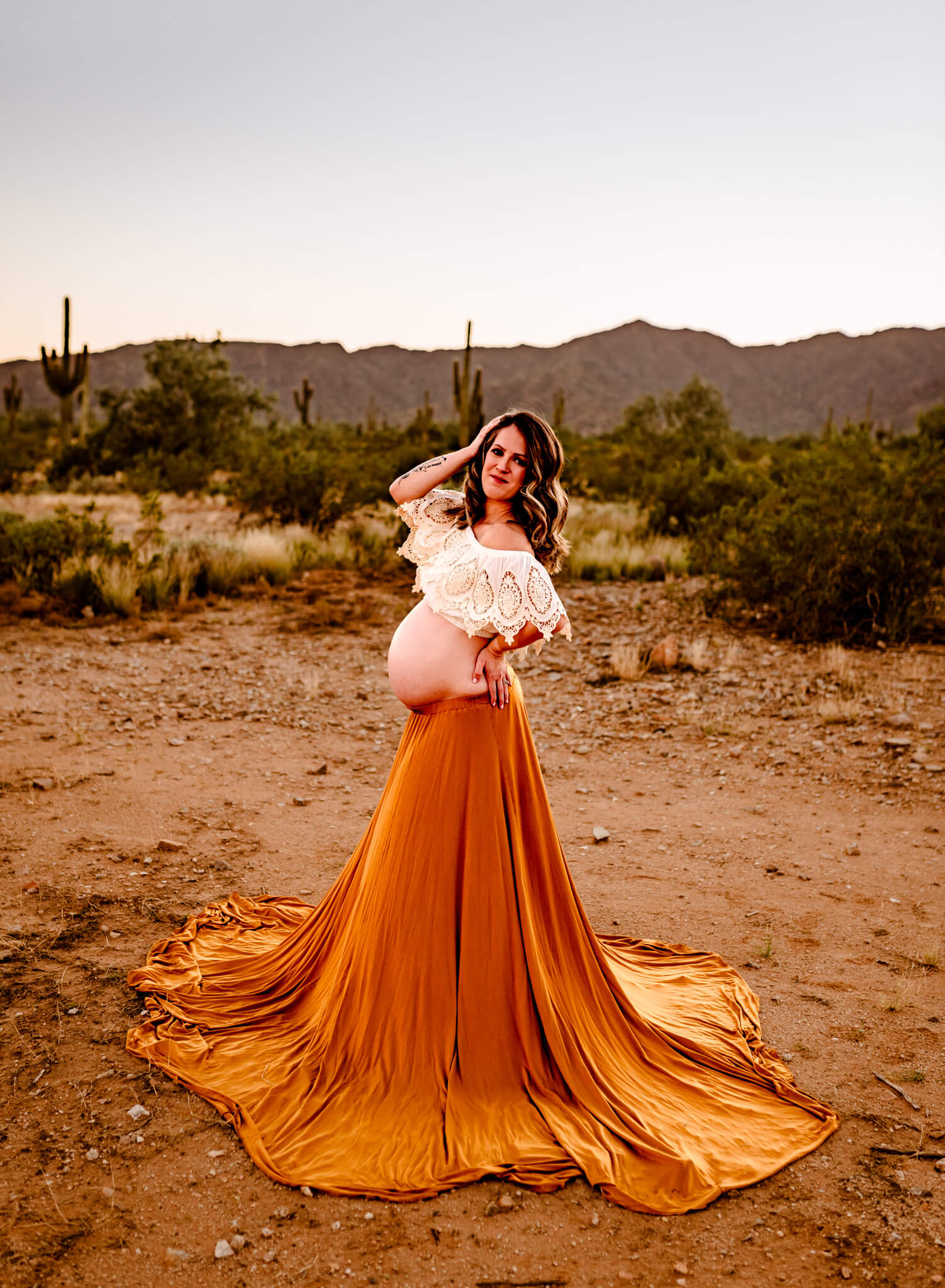 Mom posing in a unique way that would be great for Maternity Keepsake Phx piece