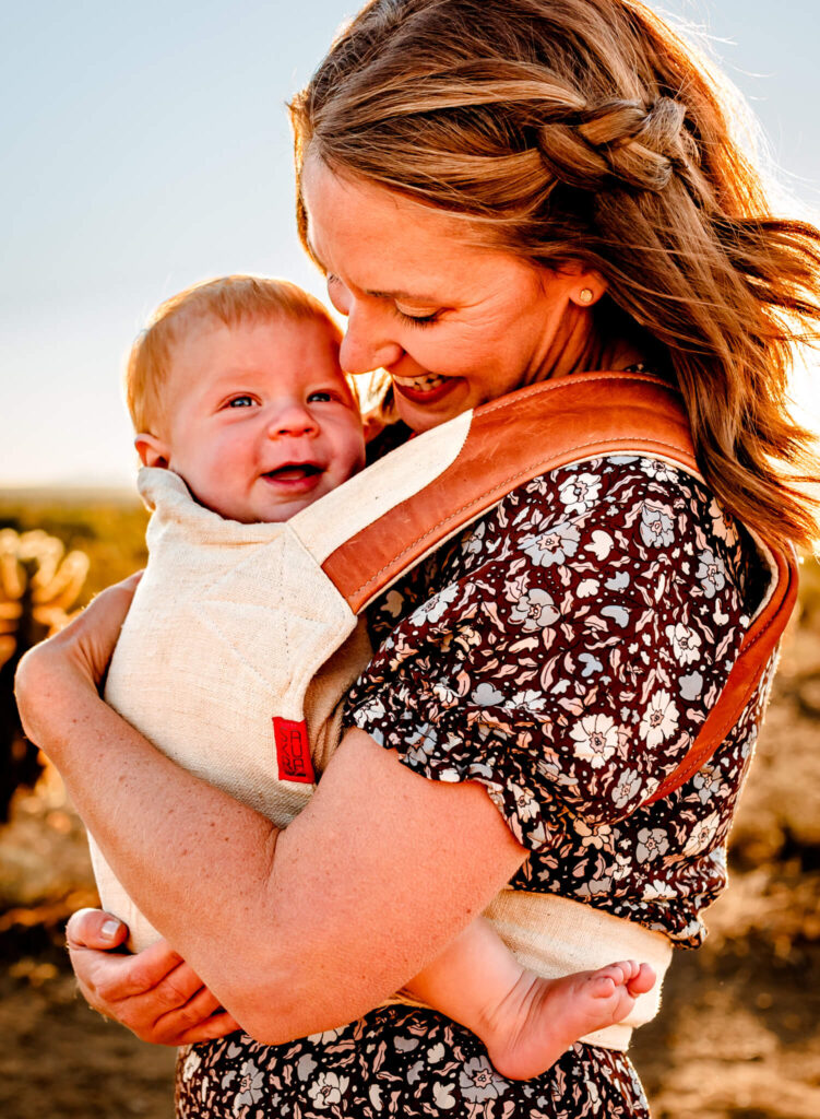 mom baby wearing in Peoria, Arizona with photographer Amber