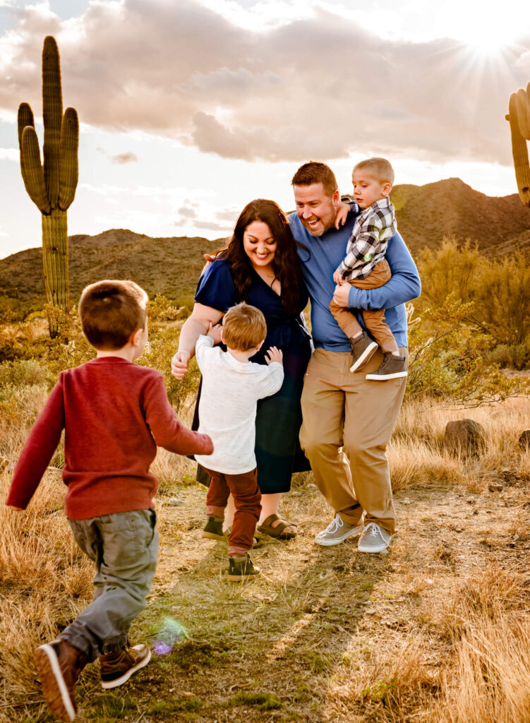 family playing during session with family photographer in Surprise, AZ