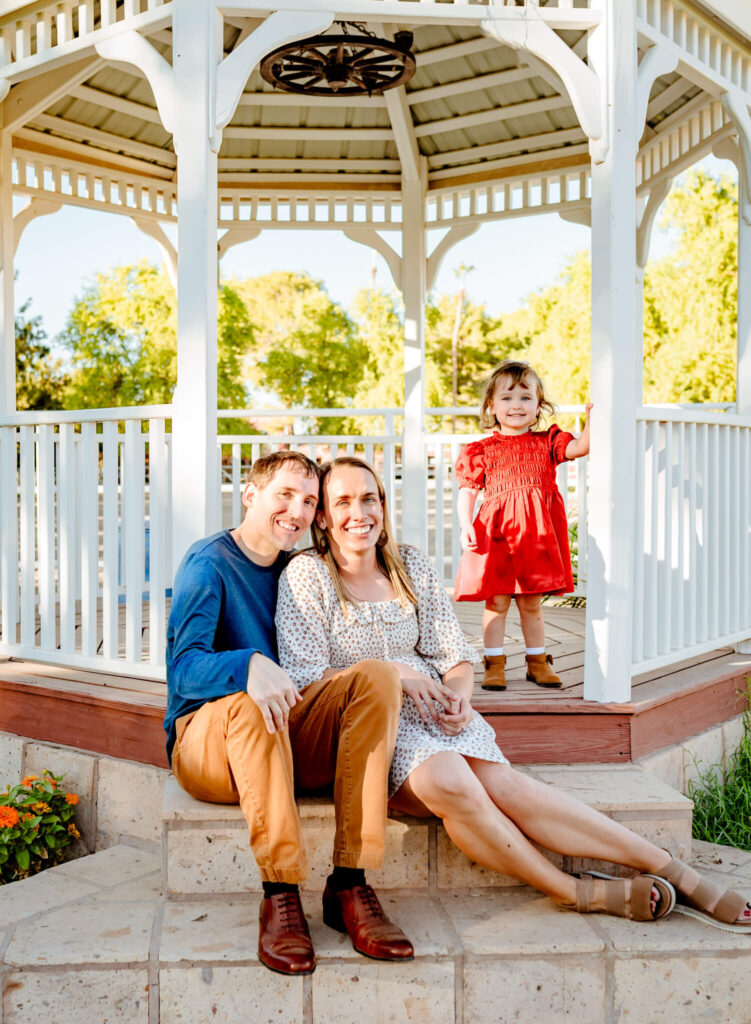 parents with daughter at perfect age for the best pumpkin patches in Phoenix