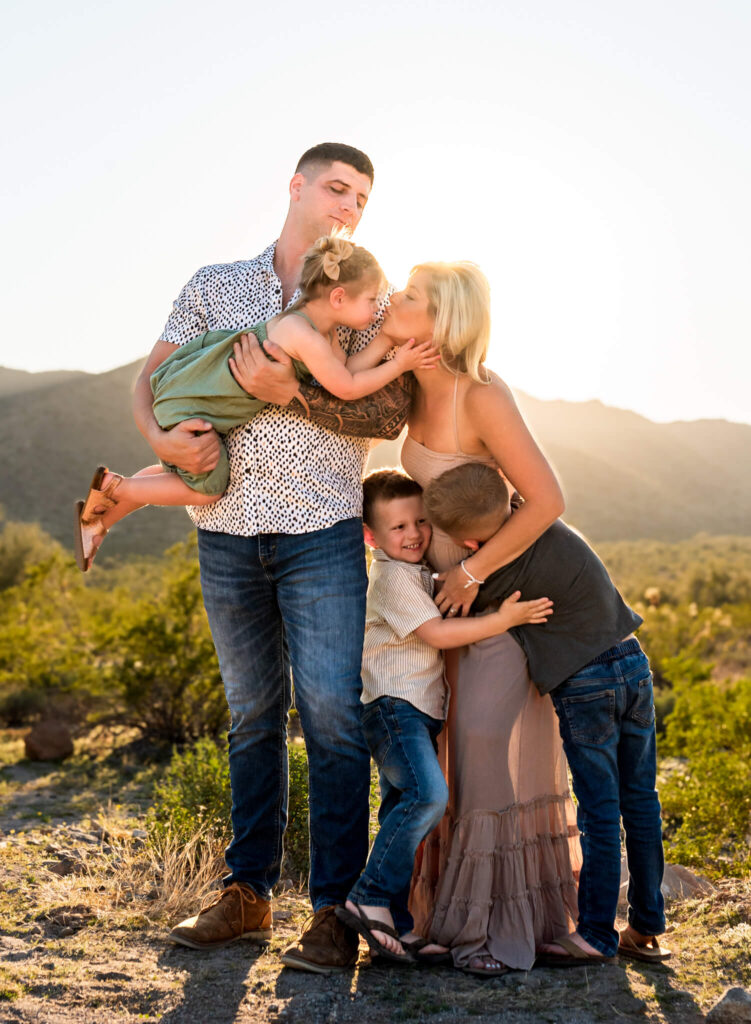 family hugging in Phoenix, best pumpkin patches